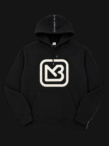 A black pullover hoodie with a large cream-colored stylized 'MB' logo on the front chest and vertical 'MB' branding printed on the inside of the hood, displayed against a solid white background.