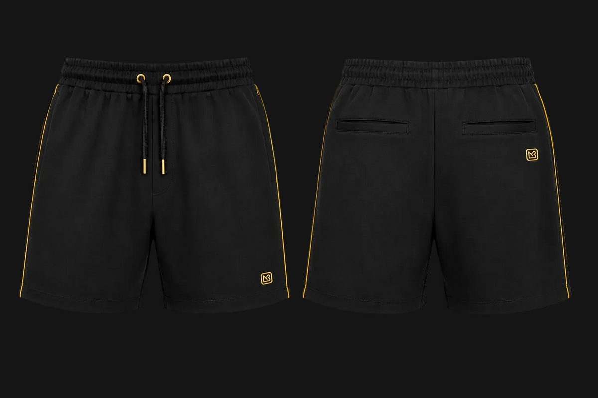Black Athletic Short shown from the front and back on a white background. The front features a drawstring waist and side stripes, while the back shows two welt pockets and a small gold logo patch.