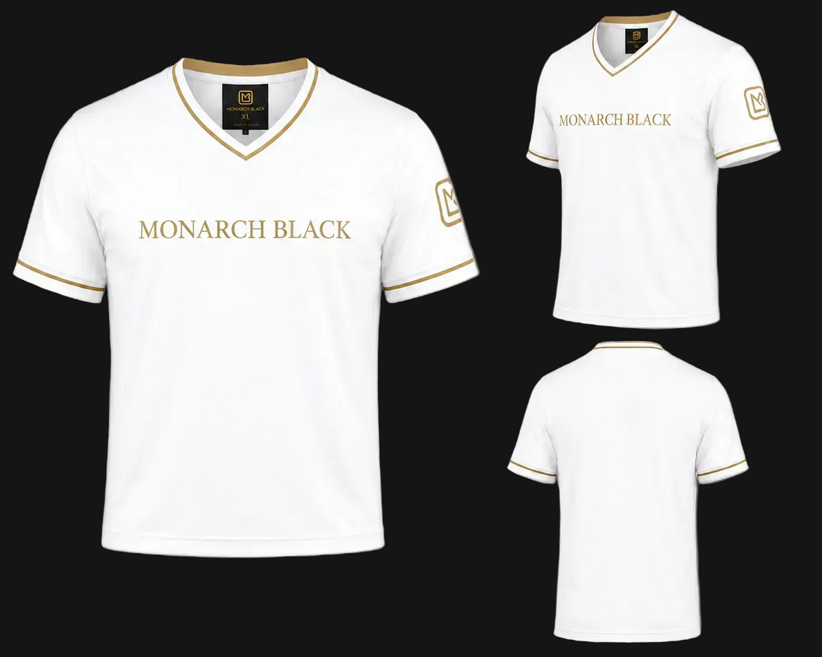 White short-sleeve V-neck jersey with gold trim and 'MONARCH BLACK' text on the chest, shown from front, front-three-quarter, and back views on a light gray background.